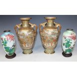 A pair of Japanese Satsuma earthenware vases, Meiji period, each painted and gilt with figural