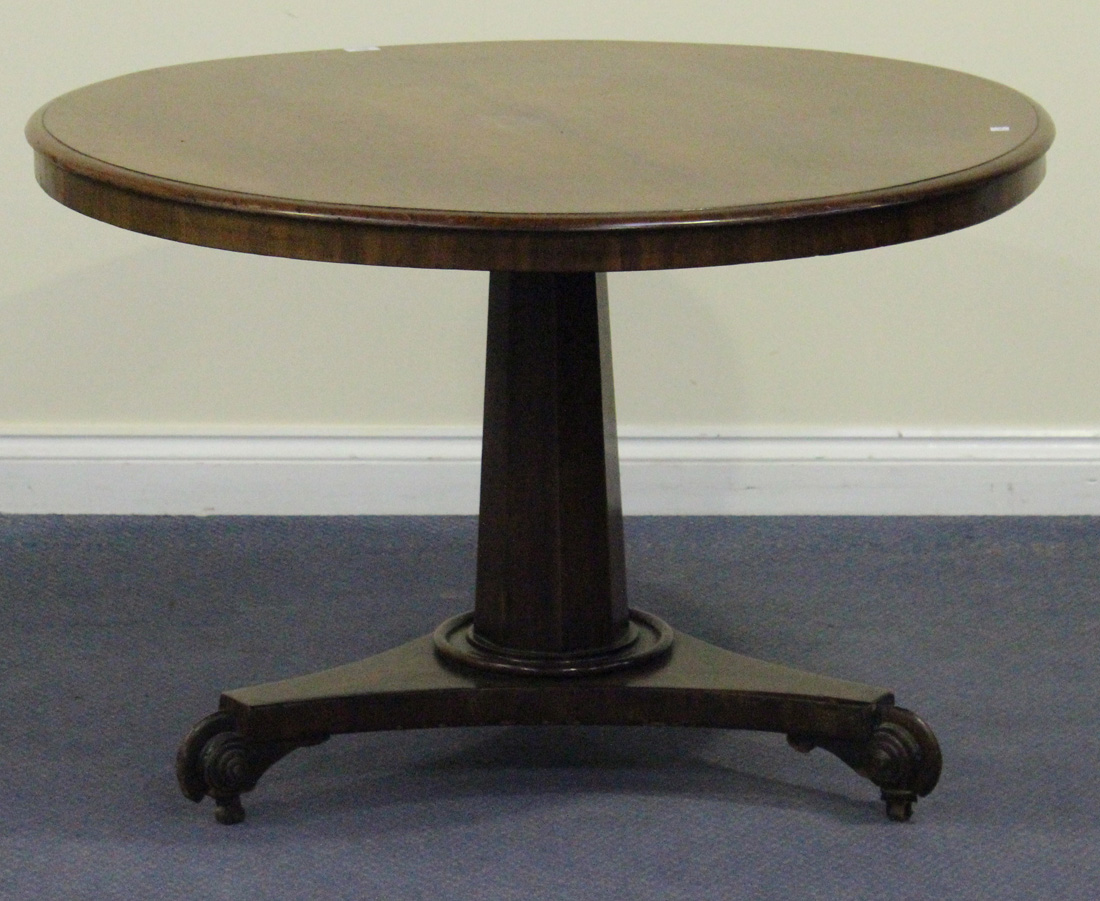 A Victorian mahogany circular tip-top breakfast table, on a triform base with scroll feet, height