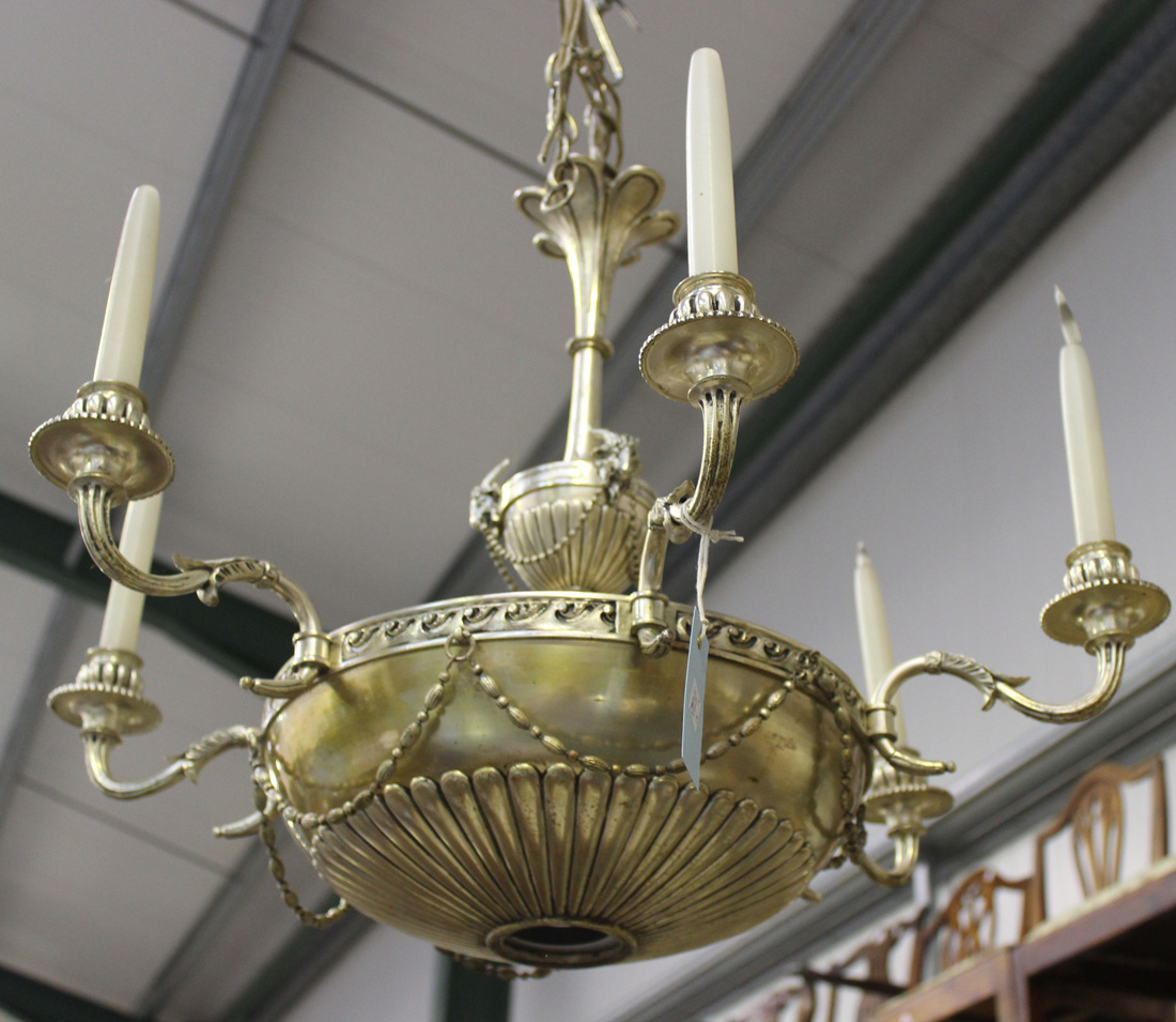 A 20th Century silvered cast metal Adam style six branch ceiling light with beaded swag
