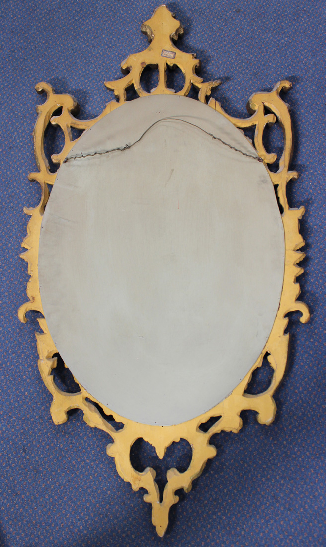 A 20th Century Italianate oval giltwood wall mirror with a carved scrollwork frame, approx 129cm x - Image 2 of 2