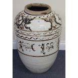 A modern South-east Asian Cizhou style ovoid floor vase, the cream glazed body decorated in brown,