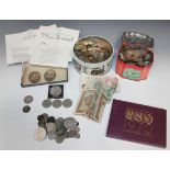 A quantity of British and foreign coins, including an Anne shilling 1709, a crown 1953, cased, three