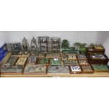 A collection of cold painted die-cast miniature military figures and accessories, some contained