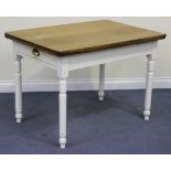 A 20th Century stripped and painted pine kitchen table, fitted with a single drawer, on turned