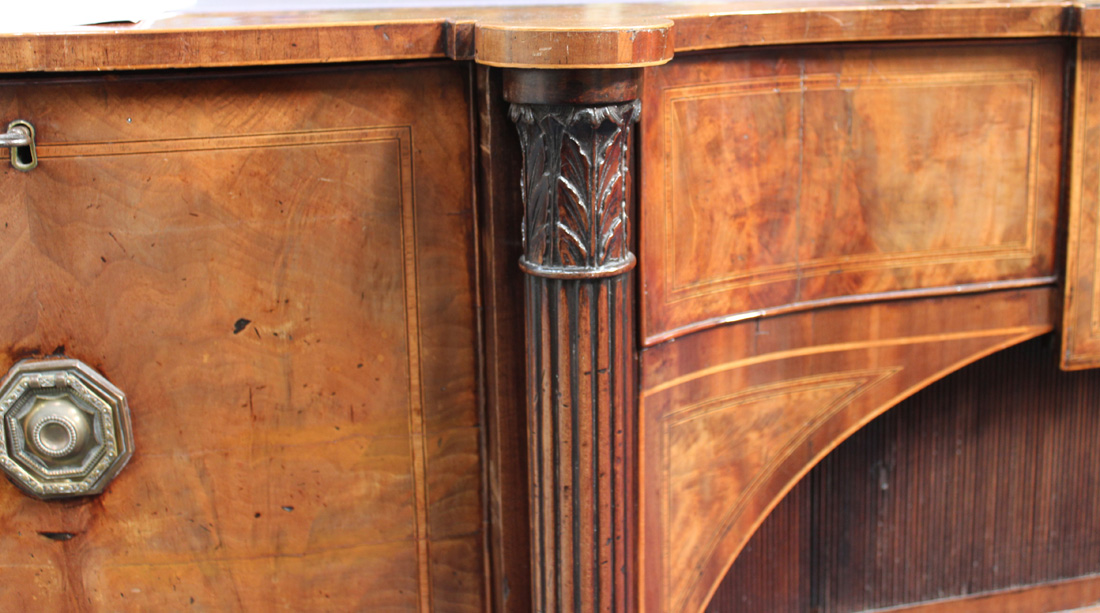A George III figured mahogany and rosewood crossbanded sideboard, the shaped top with four - Image 4 of 4