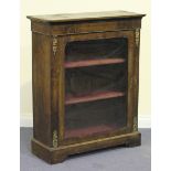A Victorian burr walnut pier cabinet with inlaid decoration and gilt metal mounts, fitted with a