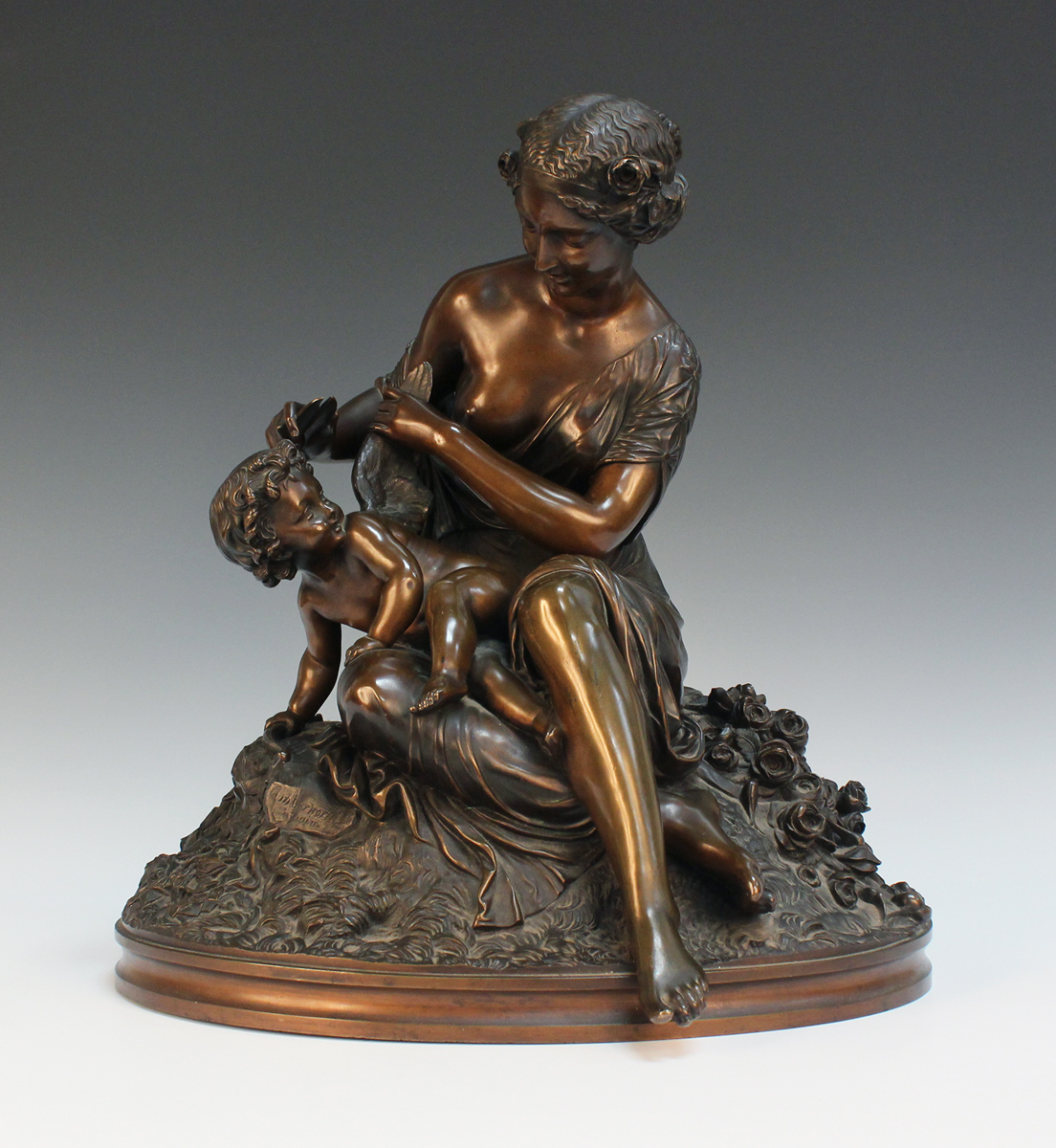 Charles Cumberworth - Venus clipping Cupid's Wings, a 19th Century French brown patinated cast