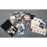 A quantity of British and foreign coinage and commemorative issues, including five pounds coins,
