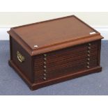 A late 20th Century hardwood numismatist's chest of seven drawers, width approx 52cm.