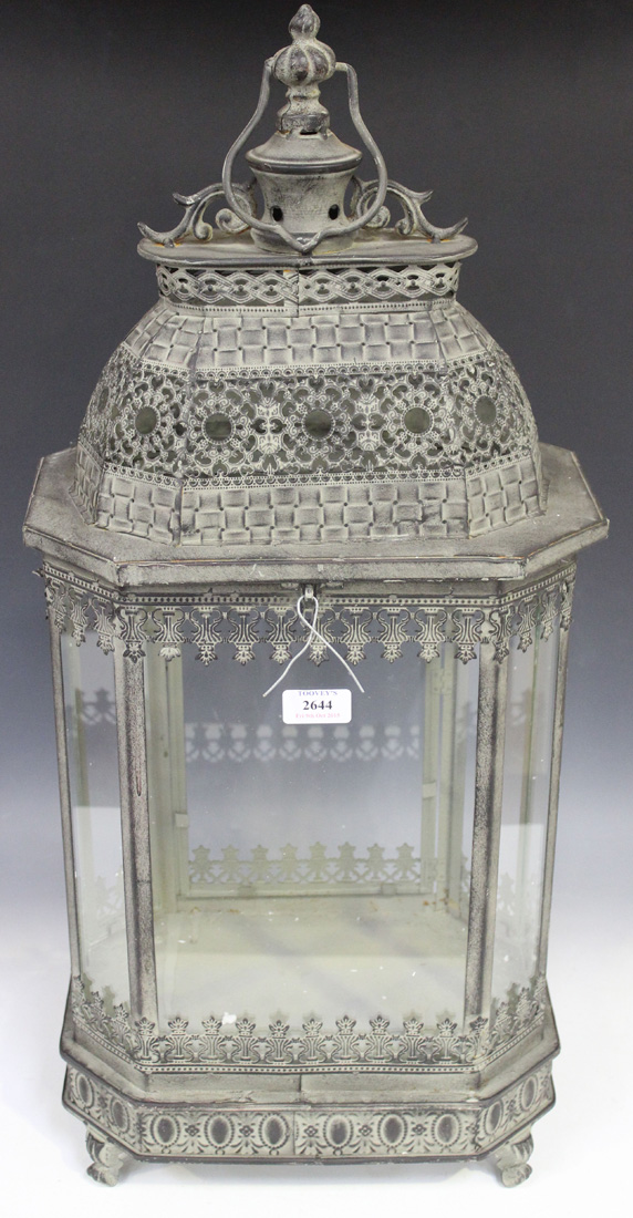 A modern Eastern style verdigris metal canted rectangular hanging lantern, height approx 72cm.