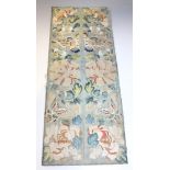 A pair of Chinese silk embroidered sleeve panels, 19th Century, each worked in coloured threads with