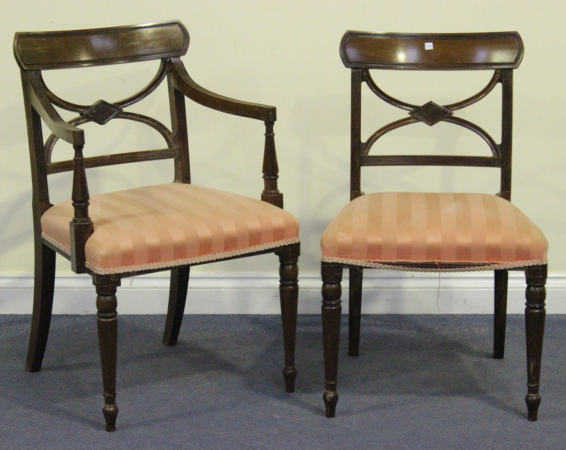 A set of twelve 20th Century Regency style mahogany 'X' frame dining chairs, comprising two