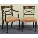 A set of twelve 20th Century Regency style mahogany 'X' frame dining chairs, comprising two