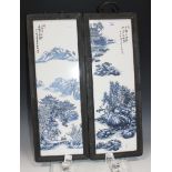 A pair of Chinese blue and white porcelain rectangular panels, late 20th Century, each decorated