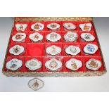 A collection of nineteen Chinese export style porcelain boxes and twenty covers, 20th Century,