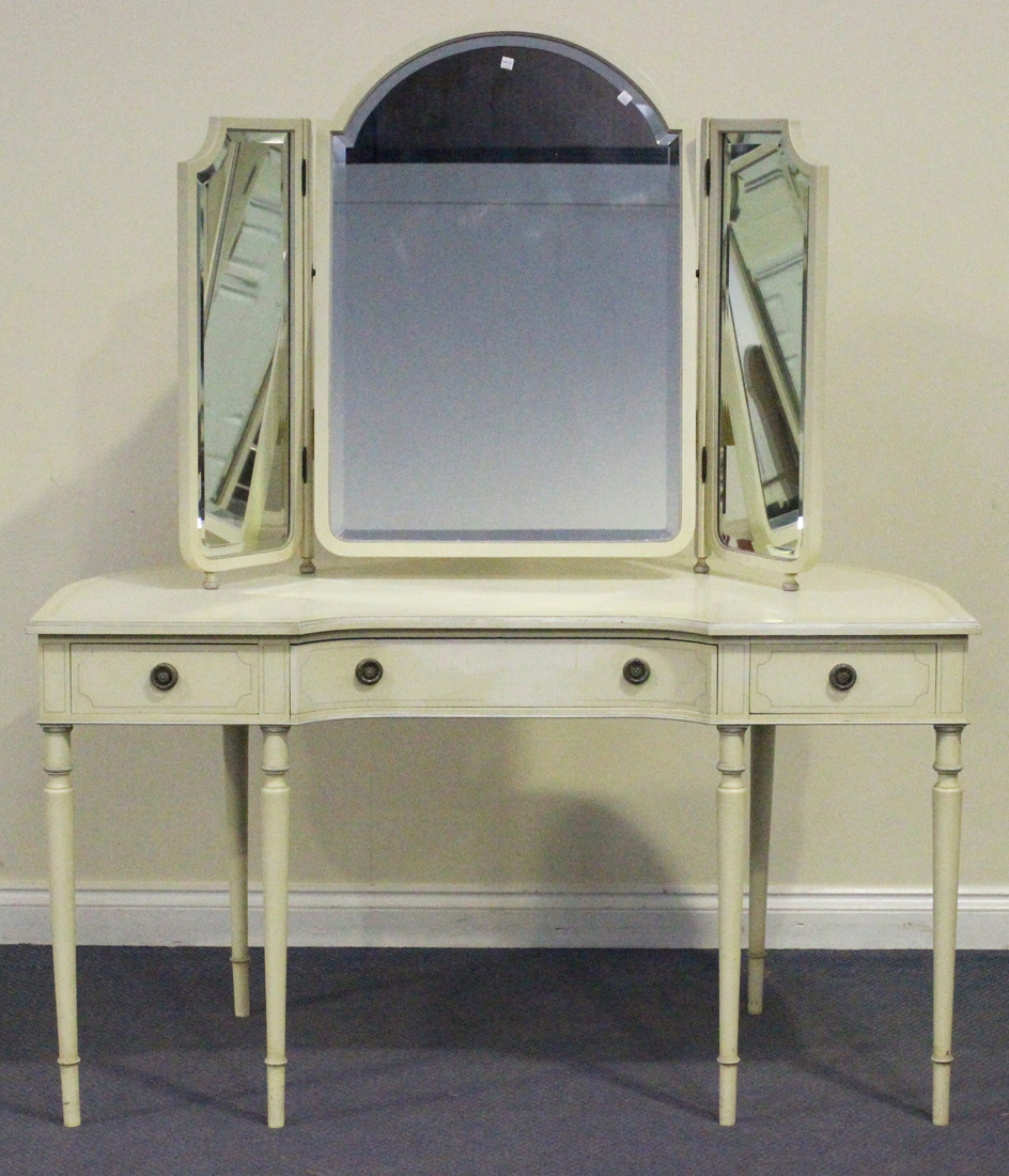 A pair of 20th Century cream painted bedside tables fitted with slides and drawers, width approx