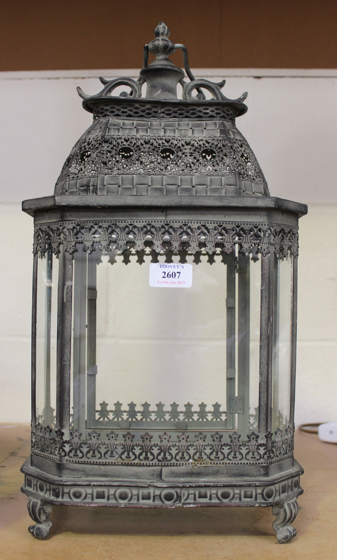 A modern Eastern style verdigris metal canted rectangular hanging lantern, height approx 50cm.