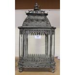 A modern Eastern style verdigris metal canted rectangular hanging lantern, height approx 50cm.