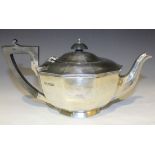 A George V silver decagonal teapot with faceted spout, Sheffield 1927 by Walker & Hall, height
