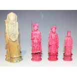 Three Chinese Canton export red stained ivory chess pieces, mid-19th Century, each with finely