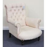 A Victorian scroll armchair upholstered in a cream patterned fabric, raised on turned walnut legs