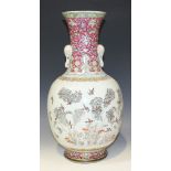 A Chinese ruby ground porcelain vase, mark of Tongzhi and possibly of the period, the ovoid body