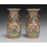 A pair of Chinese Canton famille rose porcelain vases, mid/late 19th Century, each baluster body