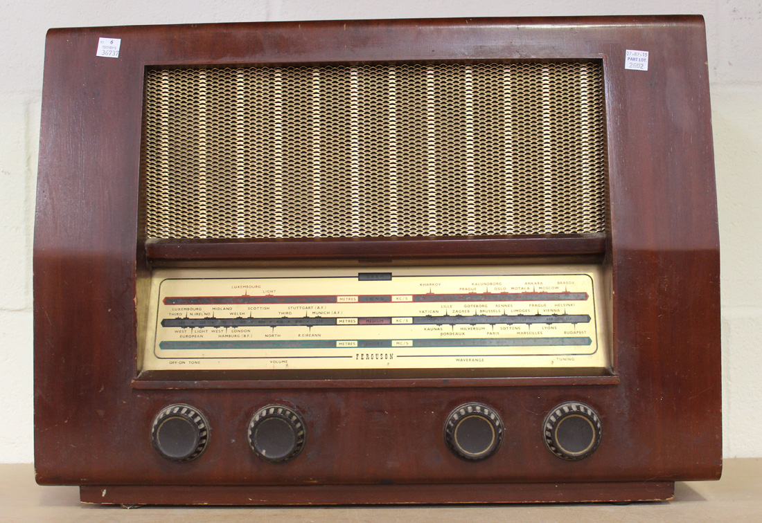 A Philips Bakelite cased radio Type 581A/15, another Philips Bakelite cased radio and a Ferguson