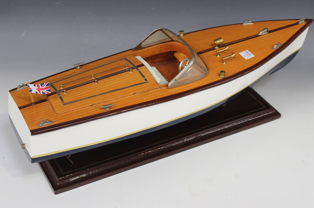 A 20th Century wooden model of a motor boat, length approx 50cm.