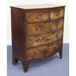 An early Victorian mahogany bowfront chest of two short and three long drawers, on bracket feet,