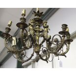 A 19th Century Louis XVI style gilt bronze six branch ceiling light, the central stem with