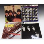 A collection of seven LP records by The Beatles, comprising a fourth pressing of 'Please Please Me',