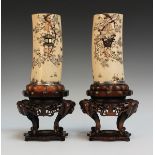 A pair of Japanese shibayama inlaid ivory tusk vases and wood stands, Meiji period, each tusk finely