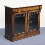 A Regency rosewood two-door side cabinet, the white marble top above a drawer and glazed panel