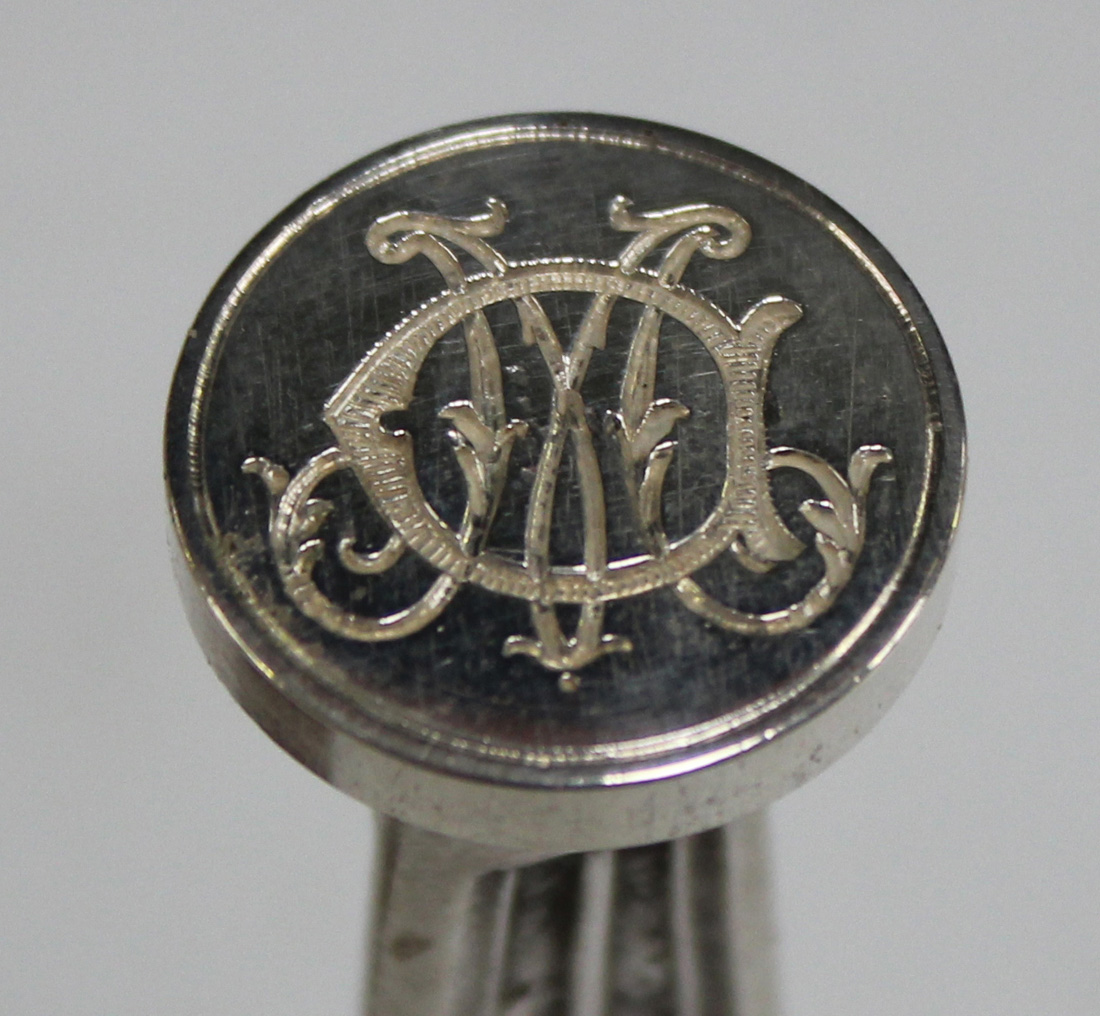 An Art Nouveau silvered cast metal desk seal of tapering triform shape, each side cast in relief - Image 2 of 2