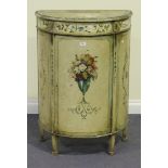 An early 20th Century George III style painted demi-lune side cabinet, decorated with floral swags