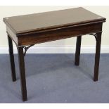 A George III mahogany rectangular card table, the top hinged to reveal a surface inset with baize,