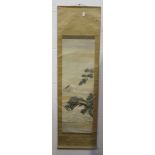 A Japanese hanging scroll painting, early 20th Century, depicting pine branches and Mount Fuji