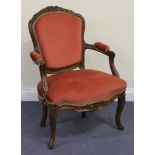 An early 20th Century Louis XV style stained beech showframe armchair, upholstered in pink velour,