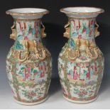 A pair of Chinese Canton famille rose porcelain vases, mid-19th Century, each shouldered ovoid