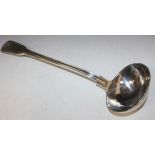 A Victorian silver Fiddle, Thread and Shell pattern soup ladle, London 1875 by Henry Holland, length
