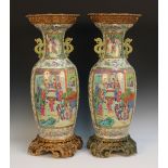 A pair of ormolu mounted Chinese Canton famille rose porcelain vases, 2nd quarter of the 19th