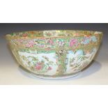 A Chinese Canton famille rose porcelain punch bowl, mid-19th Century, of steep sided circular