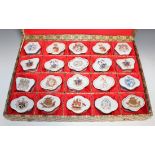 A collection of twenty Chinese export style porcelain boxes, 20th Century, of various shapes, each