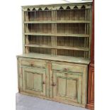 A 19th Century Irish green painted pine dresser, the shelf back above two drawers and a pair of