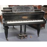 A late 19th Century ebonized baby grand piano by Winkelmann, Braunschmeig, overstrung, bearing