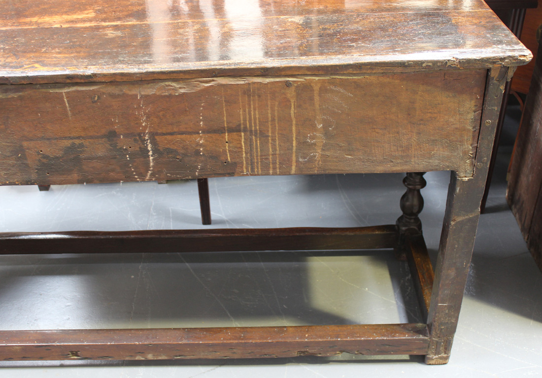 A late 17th/early 18th Century oak dresser base, the two-plank top above three frieze drawers with - Image 4 of 6