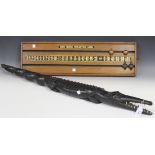 A 20th Century African carved hardwood model of a crocodile, length approx 102cm, together with a