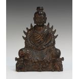 A Chinese Gandhara style gilt lacquered bronze figure of a seated Buddha, 18th/19th Century, the