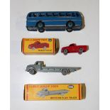 A Dublo Dinky Toys No. 066 Bedford flat truck, boxed, a No. 065 Morris pick-up truck, boxed, and a